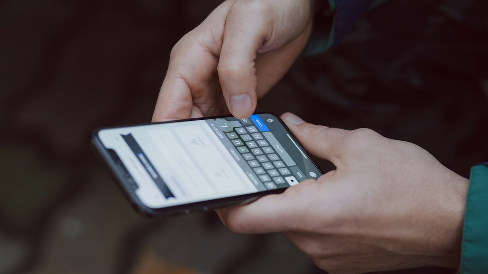 Someone looking up a local business on their phone